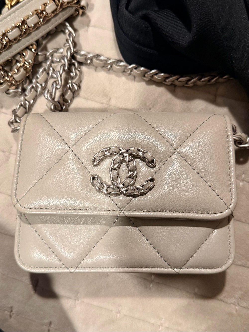 CHANEL Mini Quilted Flap Bag in Cream with Silver Hardware